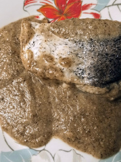 Una foto de Merluza en salsa de champiñones