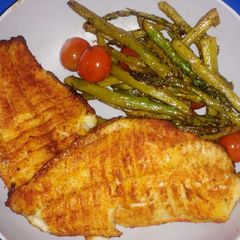 A picture of Baked Catfish with Asparagus & Tomatoes.
