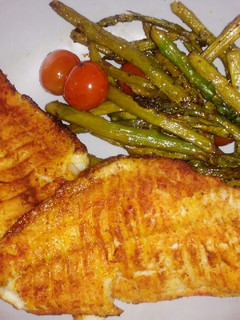 A picture of Baked Catfish with Asparagus & Tomatoes.