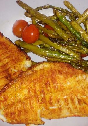 A picture of Baked Catfish with Asparagus & Tomatoes.