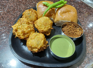 A picture of Crispy Aloo Vada & Pav.