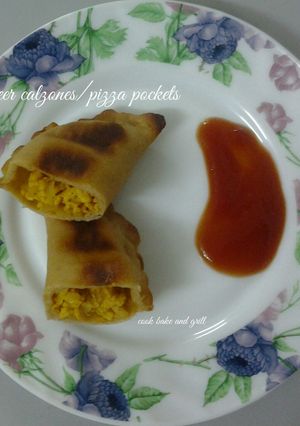 A picture of Calzones with wheat-flour dough.