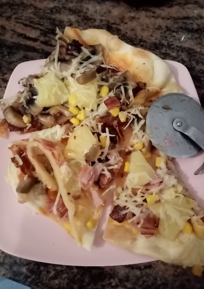 Una foto de Pizza Hawaiana