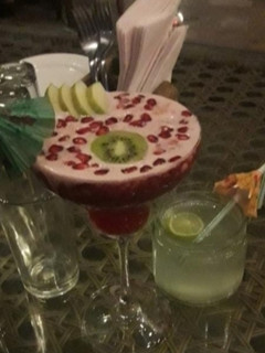 A picture of Pomegranate sunrise mocktail.