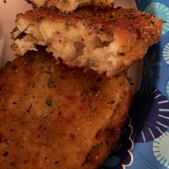 A picture of Chili Soup with Mashed Potato Cakes.