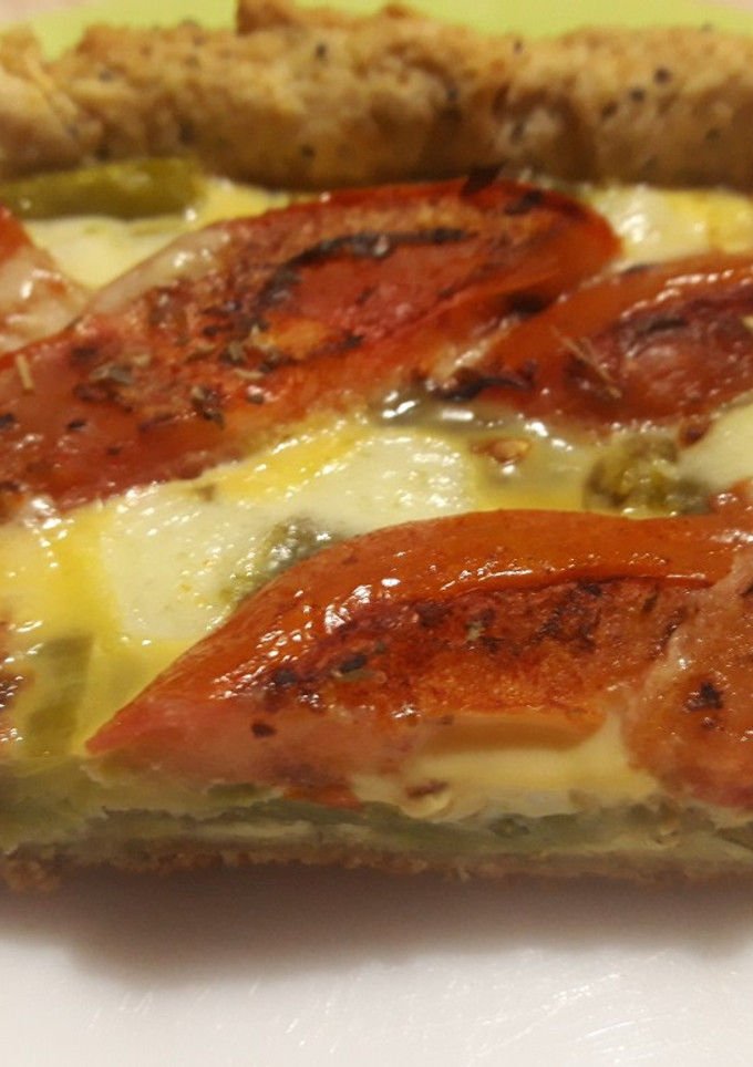 Una foto de Tarta de pencas con tomates asados