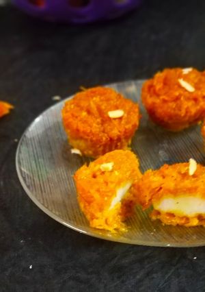 A picture of Baked cheese stuffed carrot muffin.