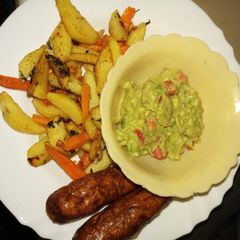 A picture of Potato wedges guacamole, and sausages #4weekschallenge.