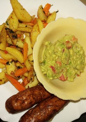 A picture of Potato wedges guacamole, and sausages #4weekschallenge.