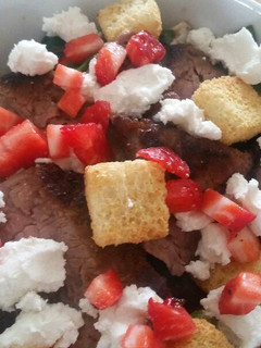 A picture of Strawberry Steak Salad w/ Roasted Peach Vinaigrette.