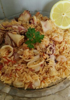 Foto principal de Arroz con tomate cherry y calamares