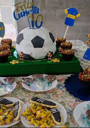 Una foto de Mesa dulce cumple infantil