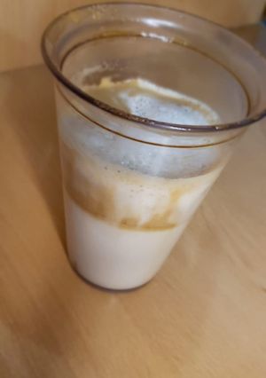 Una foto de Café con leche Súper ESPUMOSO