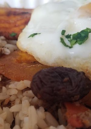 Una foto de Arroz tapado a mi manera