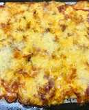 Pizza con masa de empanada