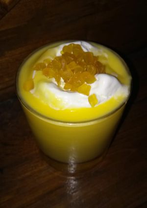 A picture of #mango  shake with ice-cream.