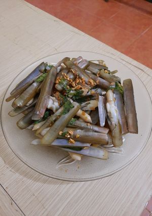 Hình của món Ốc móng tay cháy tỏi.