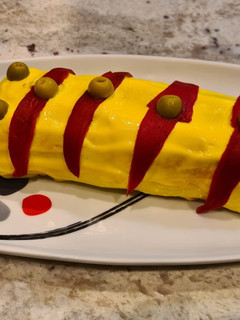 Una foto de Brazo de gitano de atún con pan de molde