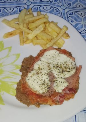Una foto de Milanesas Napolitana