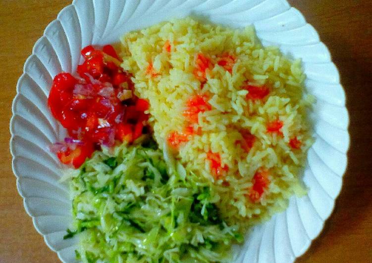 Simple Way to Prepare Perfect Coconut rice with buttered cabbage and Kachumbari