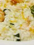 Risotto con mazzancolle marinate al limoncello, basilico fritto e zest di limonarancio