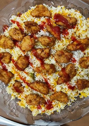 A picture of Chicken hot shots with Arabian rice.