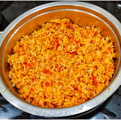 A picture of Tomato Rice In Presser Cooker.