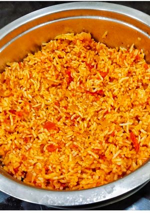 A picture of Tomato Rice In Presser Cooker.