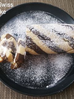 એગલેસ ઝેબ્રા સ્વિસ રોલ કેક (Eggless Zebra Swiss Roll Cake Recipe In Gujarati) રેસીપી મુખ્ય ફોટો