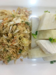 A picture of Boiled yam with egg sauce.