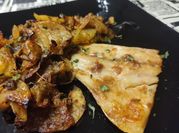 Una foto de lomo de cerdo al horno con pimentón