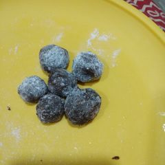 A picture of Imli candy or laddu.