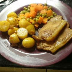 A picture of Pork Chops and Rosé Wine Potatoes.