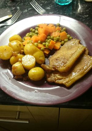 A picture of Pork Chops and Rosé Wine Potatoes.