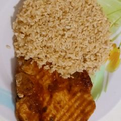 A picture of Pork rib with pumpkin and whisky sauce and rice.