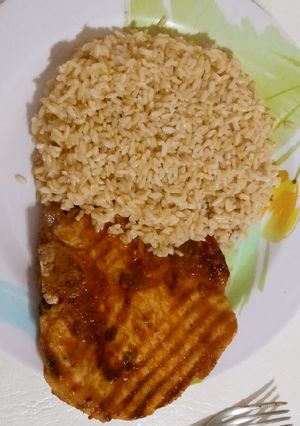 A picture of Pork rib with pumpkin and whisky sauce and rice.