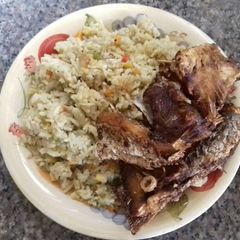 Coconut rice,mix vegetables with fresh fish A picture of Coconut rice,mix vegetables with fresh fish.