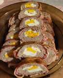 Baconbe tekert őzgerinc formában sült tojásos darált hús