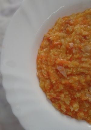 Foto di Risotto con crema di carote e prosciutto