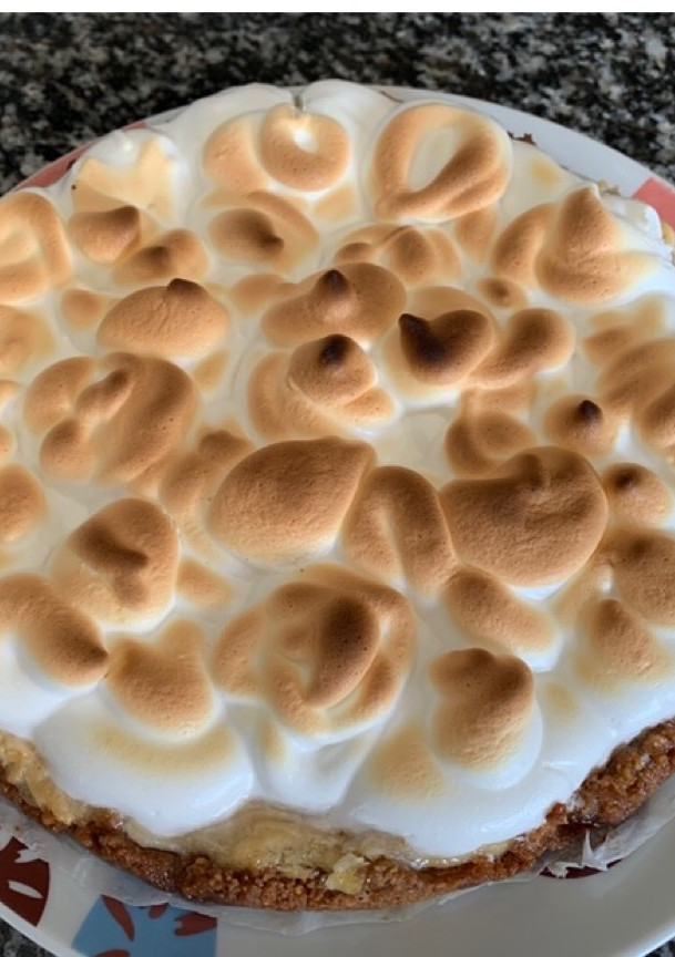 Una foto de Tarta de naranja y merengue saludable