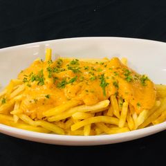 A picture of Cheesy fries 🍟.