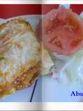 Lasaña de espinaca, jamón y queso