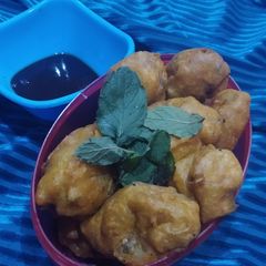 Stuffed egg bonda A picture of Stuffed egg bonda.
