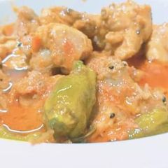 A picture of Chicken achari karhai.