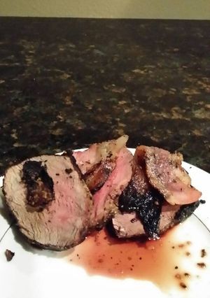 A picture of Brad's bacon wrapped grilled venison tenderloin.