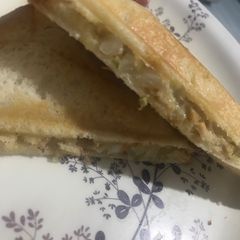 A picture of Salami sandwich triangles.