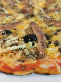 Una foto de Pizza Puttanesca