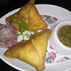 Potato peas punjabi samosa A picture of Potato peas punjabi samosa.