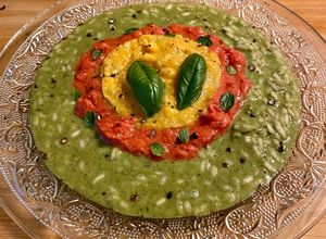 Foto di Risotto al pesto di maggiorana con salsa di pomodorini gialli e rossi