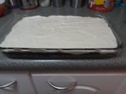 Una foto de cheesecake con leche condensada